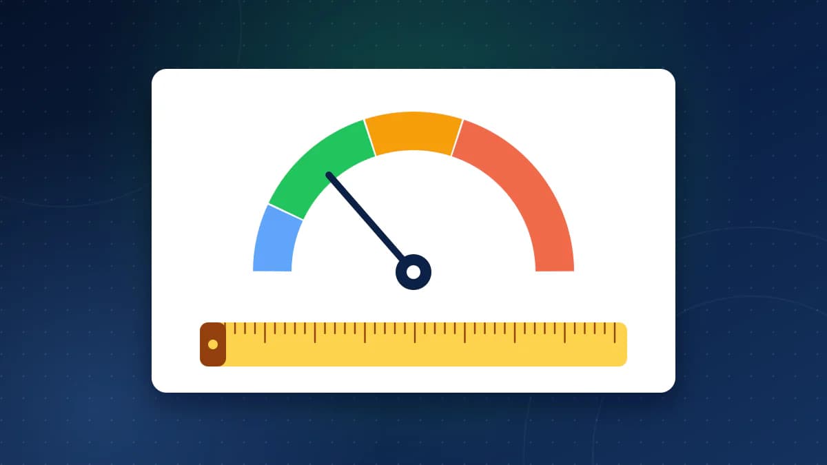 A semicircular gauge split into blue, green, amber and red bands with a needle in the green band, above a yellow measuring tape